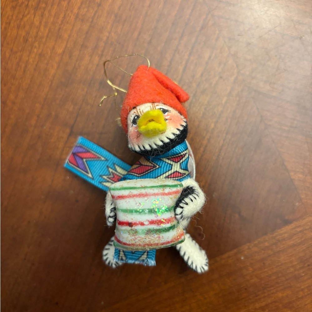 Annalee Red-Hat Penguin Ornament holding candy